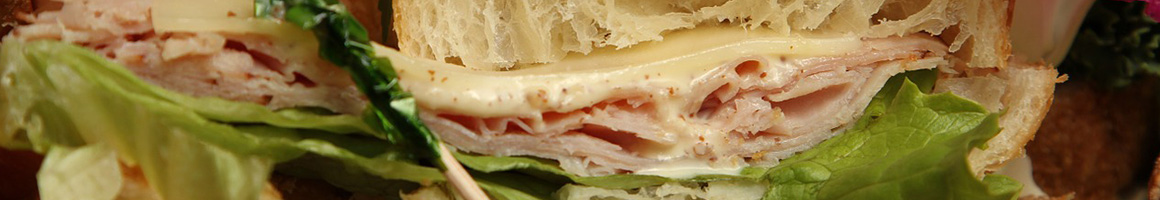 Eating Deli Sandwich at Spanky & Son Subs & Deli restaurant in Atlantic City, NJ.